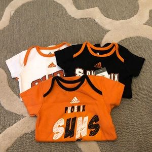 3 Phoenix suns onesies.